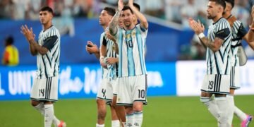 Cape Verde goalkeeper Vozinha (1) makes a save against Argentina's Lionel Messi (10) during the World Cup round of 32 soccer match between Argentina and Cape Verde in Miami Gardens, Fla., Friday, July 3, 2026. (AP Photo/Marta Lavandier)